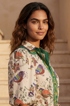 White boho dress with a bird print and bell sleeves, perfect for casual summer outings. 1