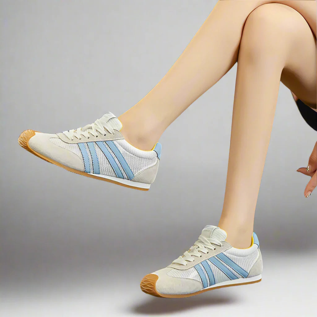 Lightweight black running sneakers with a sleek, modern design and breathable mesh upper. 4
