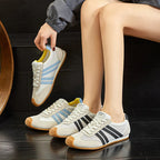 Lightweight black running sneakers with a sleek, modern design and breathable mesh upper. 5