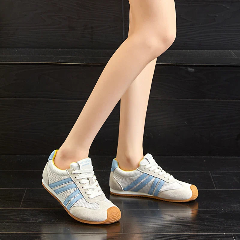 Lightweight black running sneakers with a sleek, modern design and breathable mesh upper. 6