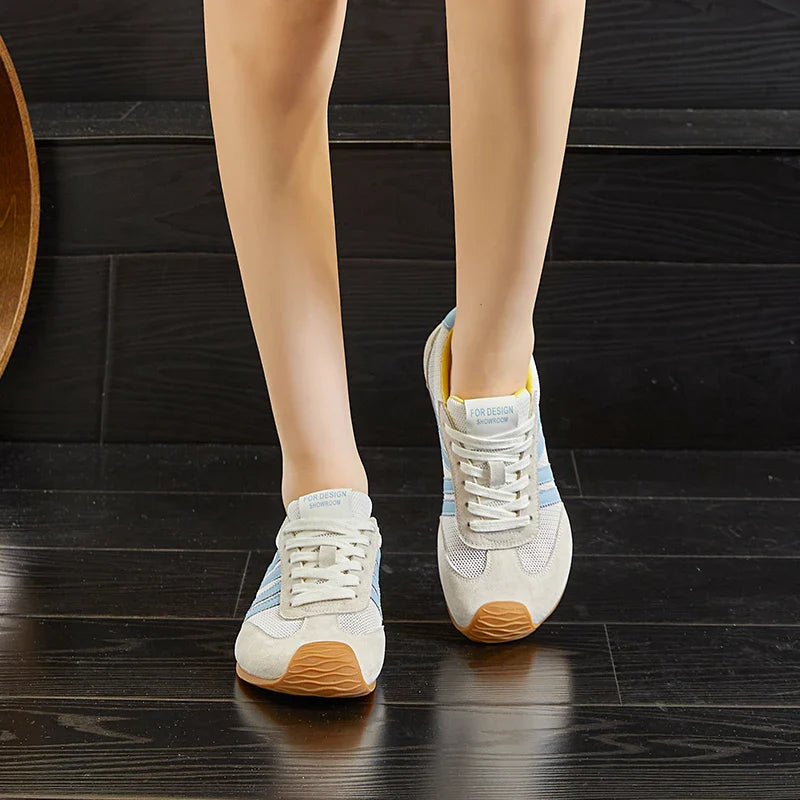 Lightweight black running sneakers with a sleek, modern design and breathable mesh upper. 7