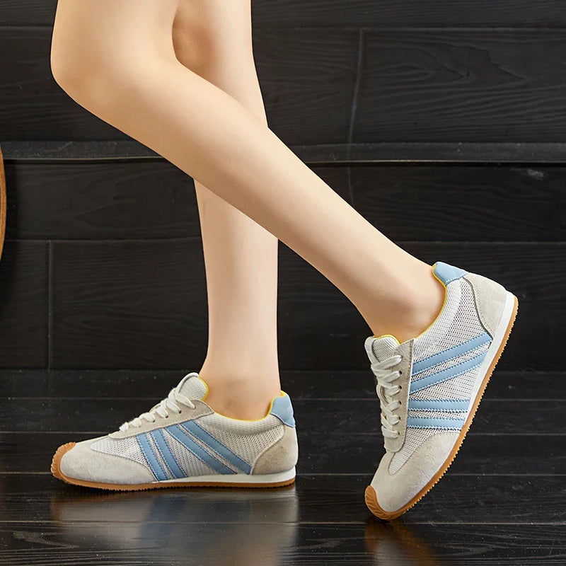 Lightweight black running sneakers with a sleek, modern design and breathable mesh upper. 8