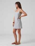 Azure mini dress with a square neckline and tailored fit, perfect for summer outings. 6