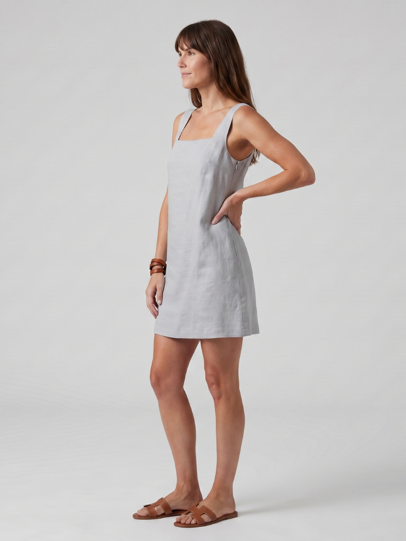 Azure mini dress with a square neckline and tailored fit, perfect for summer outings. 6