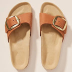 Brielle cork slides in natural tan with a minimalist design, featuring a comfortable slip-on style. 0