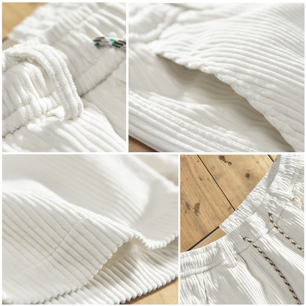 Light gray casual cotton shorts featuring a relaxed fit and adjustable drawstring. 3