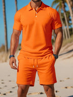 Caleb men's polo shirt in navy blue, featuring a classic fit and breathable fabric for casual wear. 2