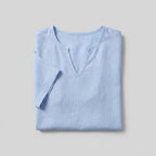 Relaxed fit men's t-shirt in light blue, made from breathable linen, featuring a v-neck and short sleeves. 6