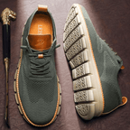 Caleb textured knit oxford shoes in navy blue, featuring a lace-up closure and a casual sneaker sole. 0