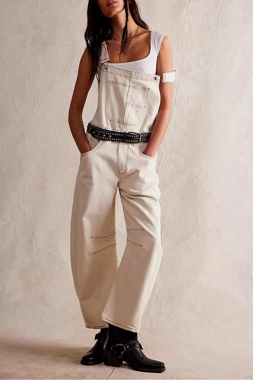Blue denim overalls with a relaxed fit and adjustable straps, perfect for casual, everyday wear. 0