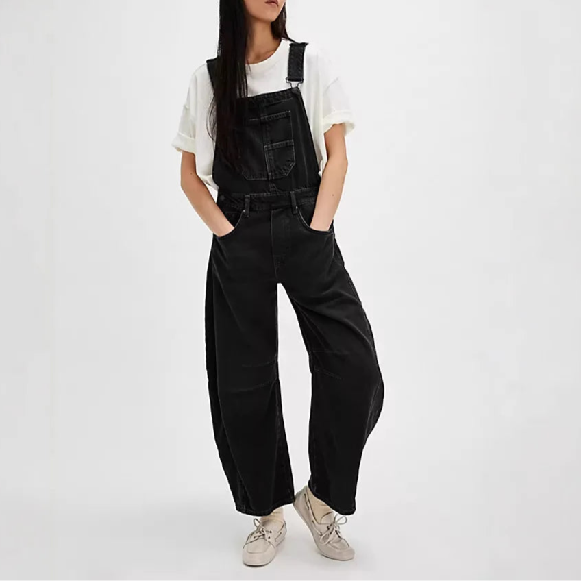 Blue denim overalls with a relaxed fit and adjustable straps, perfect for casual, everyday wear. 2