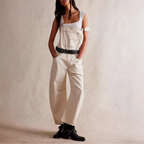 Blue denim overalls with a relaxed fit and adjustable straps, perfect for casual, everyday wear. 3