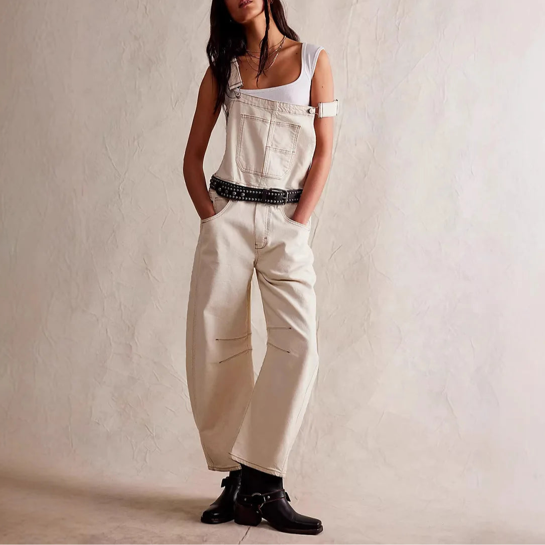 Blue denim overalls with a relaxed fit and adjustable straps, perfect for casual, everyday wear. 3