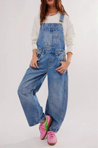Blue denim overalls with a relaxed fit and adjustable straps, perfect for casual, everyday wear. 5