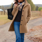 Single-breasted wool-look coat for women with a notched collar.