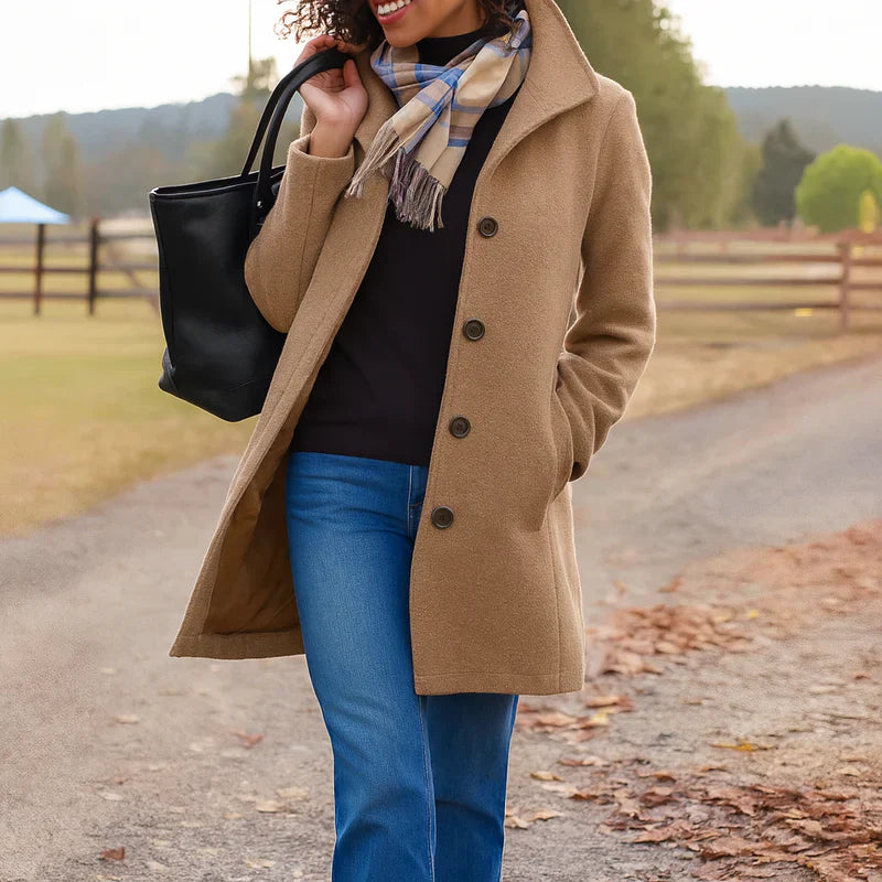 Single-breasted wool-look coat for women with a notched collar.