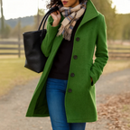 Single-breasted wool-look coat for women with a notched collar.