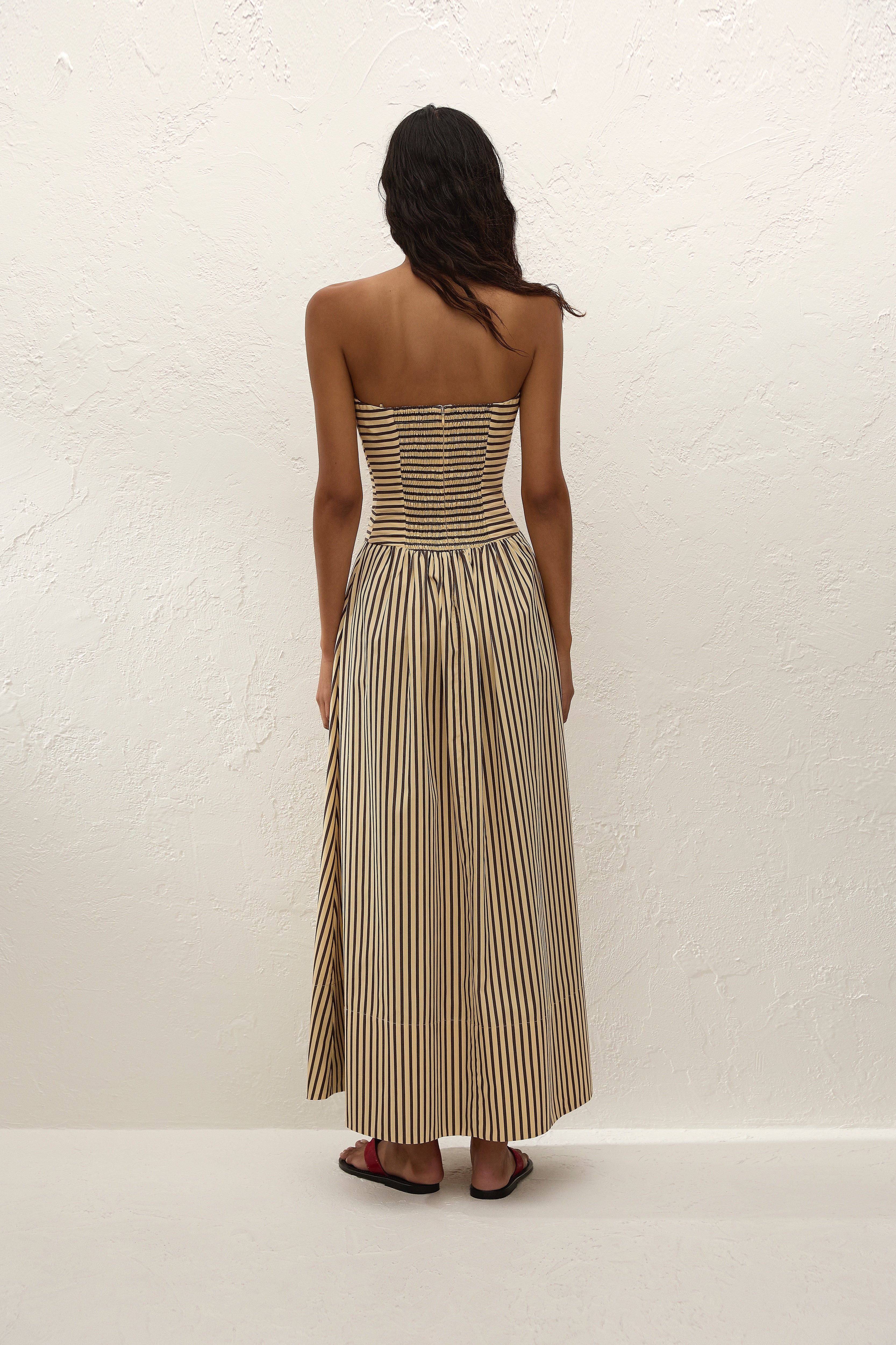 Sleeveless maxi dress in sand with striped pattern, perfect for summer casual wear. 3