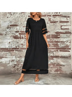 Elegant midi dress in soft lavender with a round neckline, featuring a flowing silhouette for a timeless look. 2