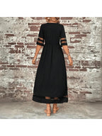 Elegant midi dress in soft lavender with a round neckline, featuring a flowing silhouette for a timeless look. 3