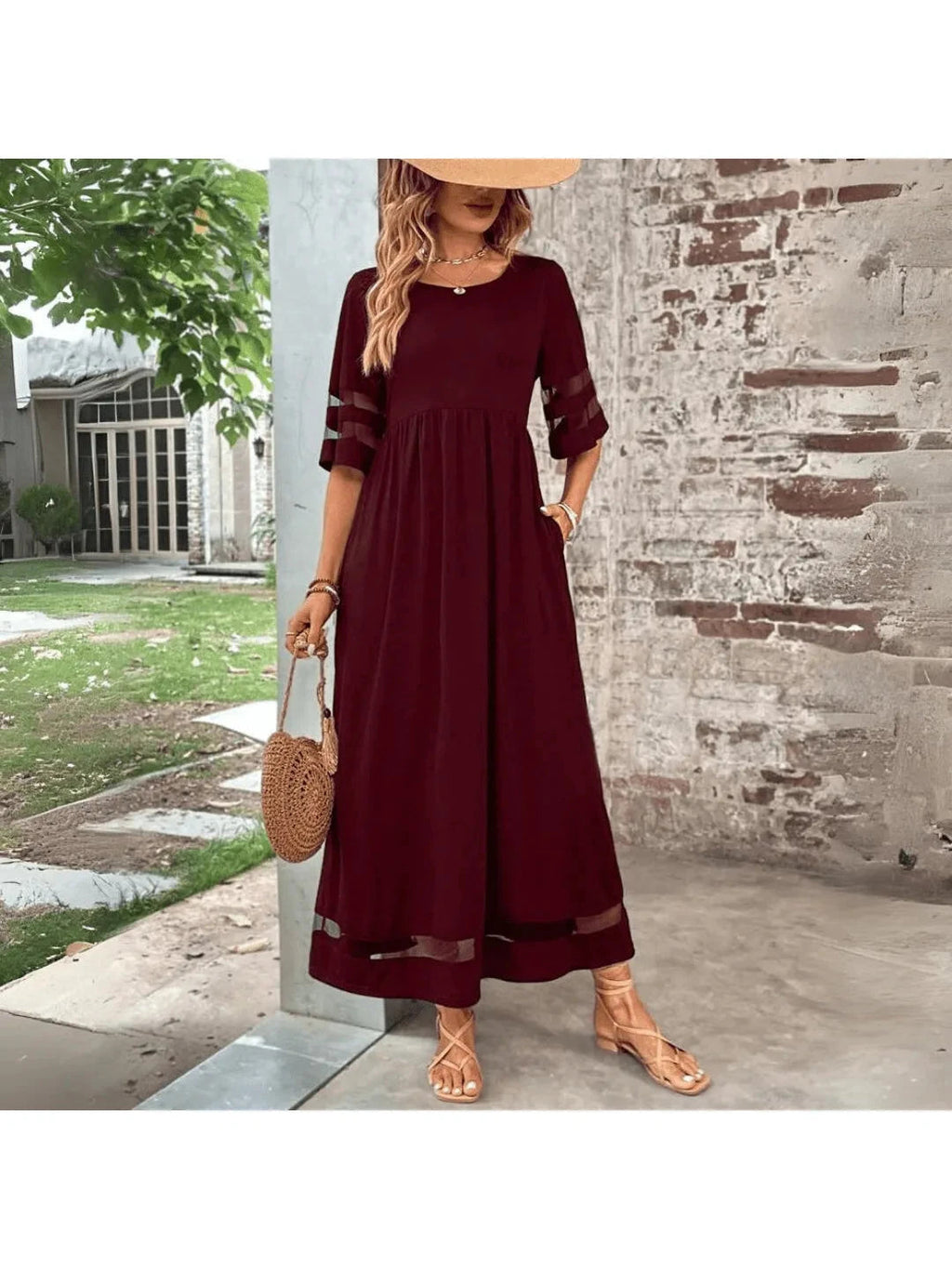 Elegant midi dress in soft lavender with a round neckline, featuring a flowing silhouette for a timeless look. 4