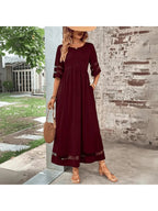 Elegant midi dress in soft lavender with a round neckline, featuring a flowing silhouette for a timeless look. 4