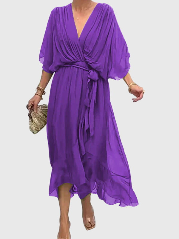 Cassandra women's dress in soft lavender, featuring a V-neck and a flattering silhouette, perfect for weddings. 3