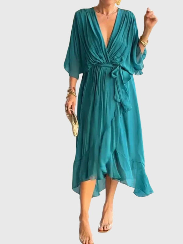 Cassandra women's dress in soft lavender, featuring a V-neck and a flattering silhouette, perfect for weddings. 4