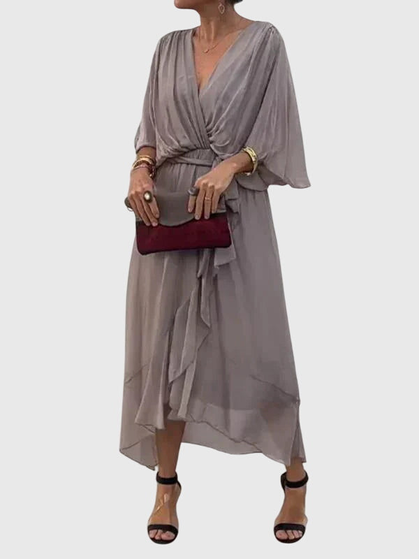 Cassandra women's dress in soft lavender, featuring a V-neck and a flattering silhouette, perfect for weddings. 5