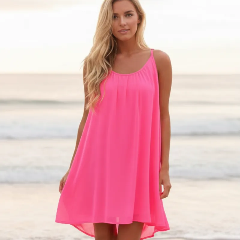 Lightweight mini beach cover-up dress in soft white, featuring a relaxed O-neckline and sleeveless design. 4