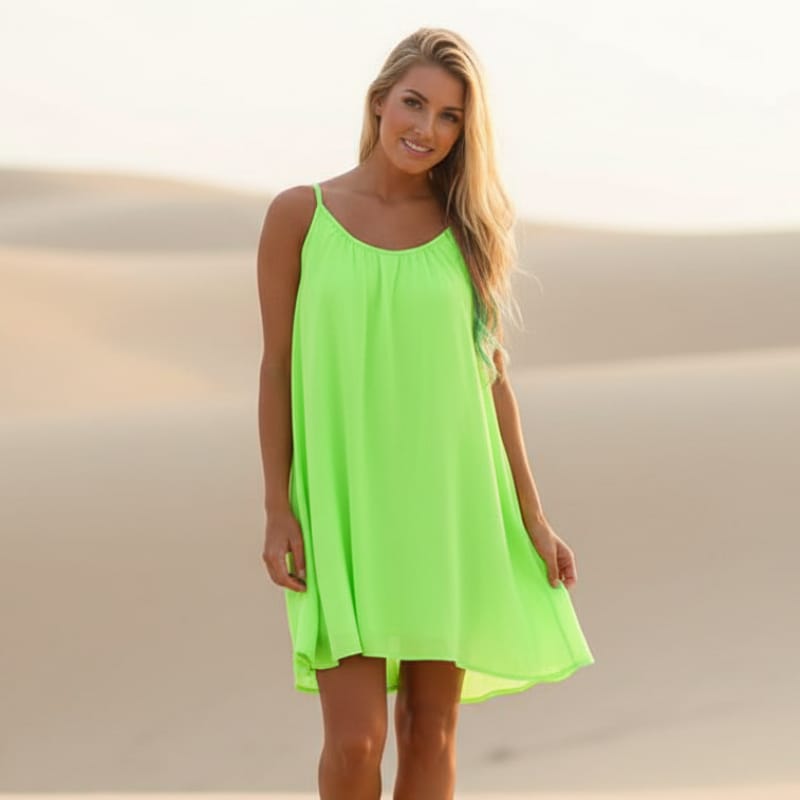 Lightweight mini beach cover-up dress in soft white, featuring a relaxed O-neckline and sleeveless design. 6