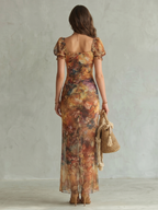 Light blue midi dress with ruffled sleeves and a ruched design, featuring a stylish slit for a summer look. 3