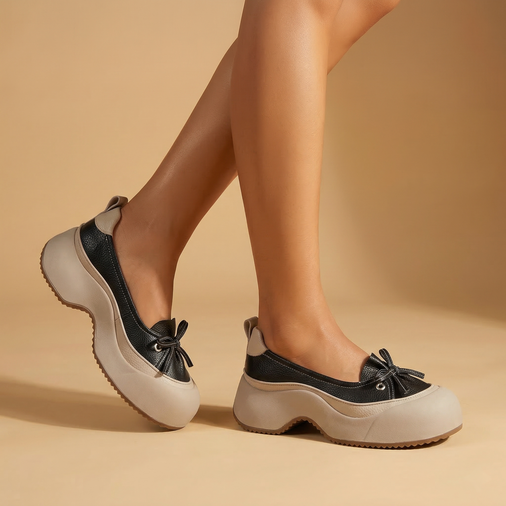 Clara cushioned support shoes in soft beige vegan leather, featuring a sleek and minimalist design for everyday wear. 1