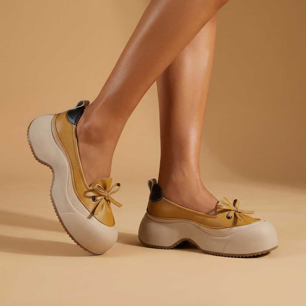 Clara cushioned support shoes in soft beige vegan leather, featuring a sleek and minimalist design for everyday wear. 4
