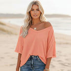 Clara oversized short sleeve V-neck shirt in light blue, made from a soft cotton-polyester blend. 5