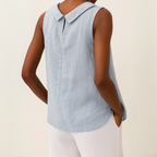 Light blue sleeveless linen cotton blend top with a pleated collar, featuring a relaxed and casual style. 2