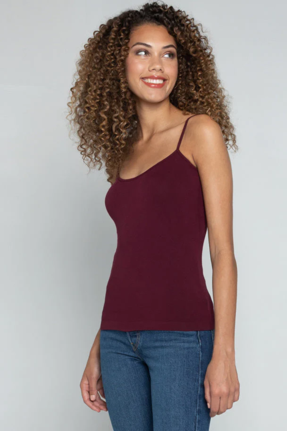 Light gray camisole made from a bamboo blend, featuring adjustable straps and a relaxed, casual style. 14