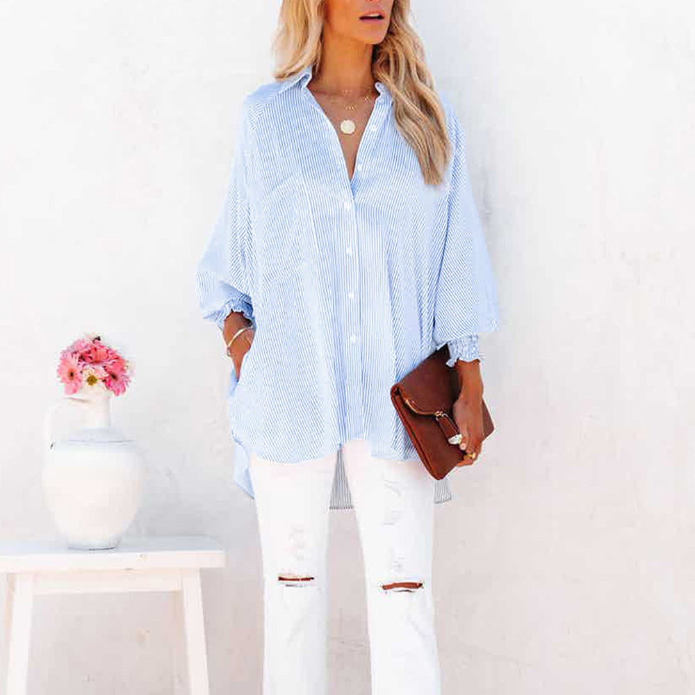 Relaxed fit button-up shirt for women in soft pastel blue cotton blend. 0