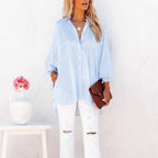 Relaxed fit button-up shirt for women in soft pastel blue cotton blend. 0