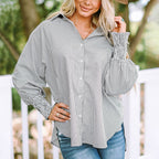 Relaxed fit button-up shirt for women in soft pastel blue cotton blend. 2