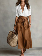 Soft beige two-piece midi set in a relaxed style, featuring a tie-waist sash for an effortless look. 3