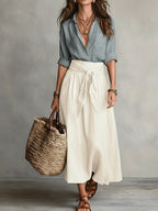 Soft beige two-piece midi set in a relaxed style, featuring a tie-waist sash for an effortless look. 4
