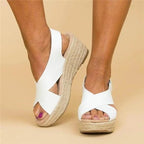 Cleo Comfort Sandals in soft beige, featuring a minimalist design with adjustable straps and a cushioned footbed. 1