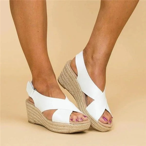 Cleo Comfort Sandals in soft beige, featuring a minimalist design with adjustable straps and a cushioned footbed. 2