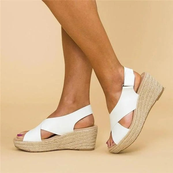 Cleo Comfort Sandals in soft beige, featuring a minimalist design with adjustable straps and a cushioned footbed. 3