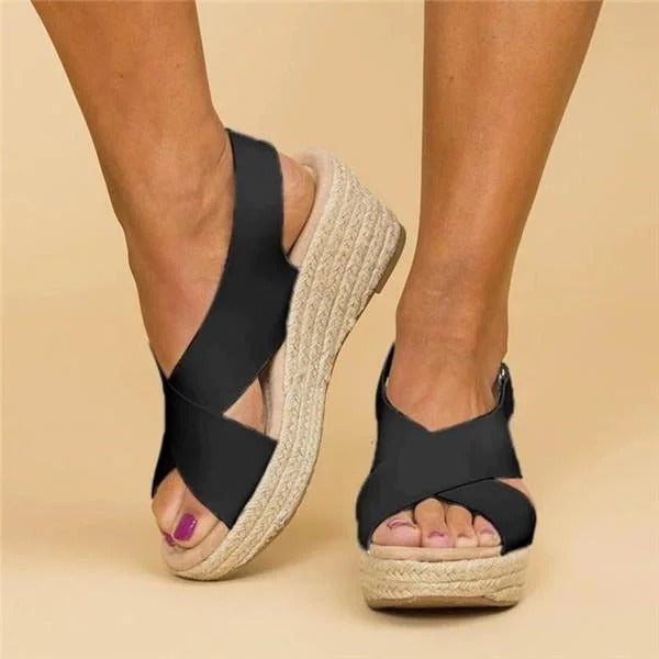 Cleo Comfort Sandals in soft beige, featuring a minimalist design with adjustable straps and a cushioned footbed. 4