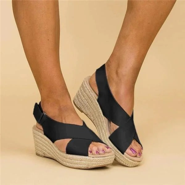 Cleo Comfort Sandals in soft beige, featuring a minimalist design with adjustable straps and a cushioned footbed. 5