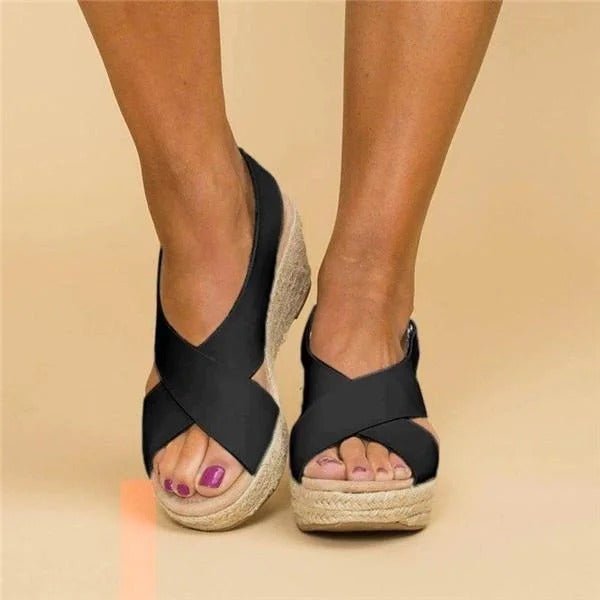 Soft leather women's sandals in tan with adjustable cross straps for a comfortable, casual look. 6