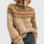 Beige chunky knit turtleneck jumper for women with a patterned yoke in rust and olive.