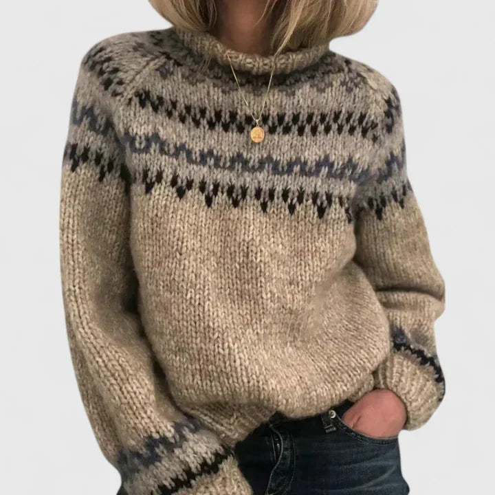 Chunky knit turtleneck jumper for women with a patterned yoke.